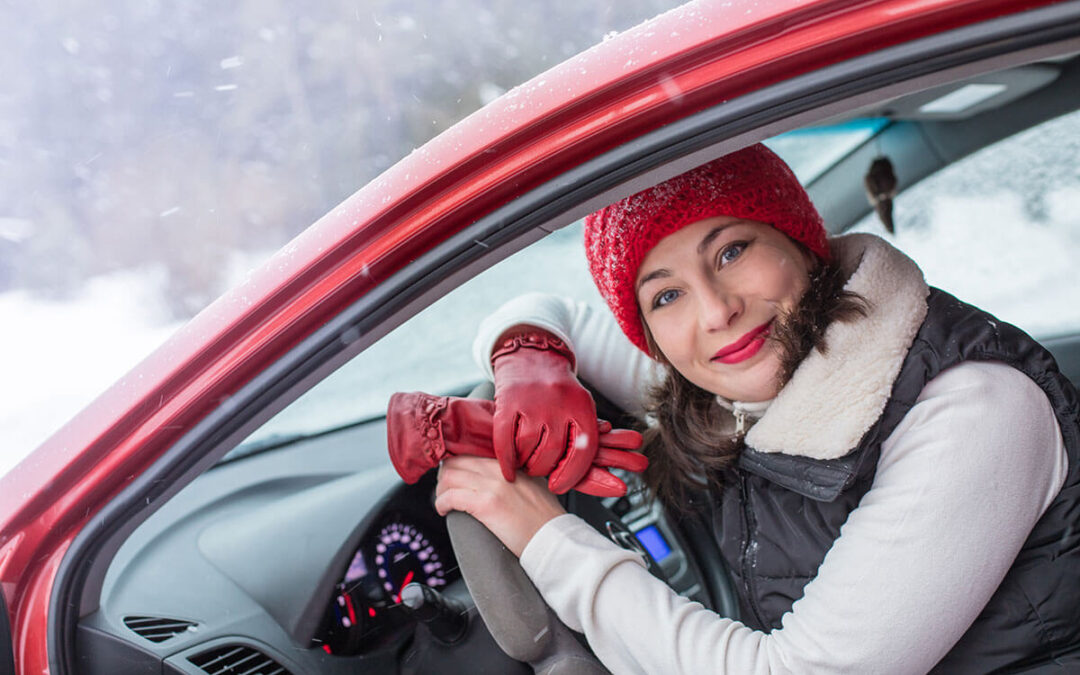 Girl in a red cap and warm jacket